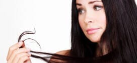 woman is not happy with her fragile hair, white background