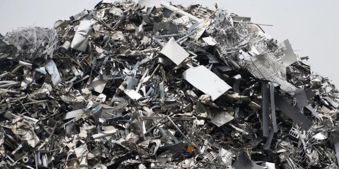 Large stack of aluminum and ferrous materials scrap ready for recycling